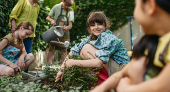 Children smile on a school field trip