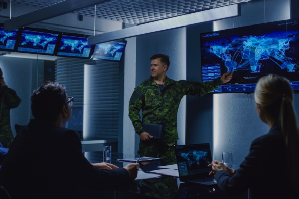 A military officer conducts an important briefing